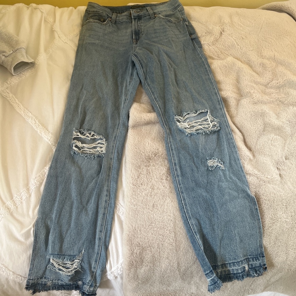 Women's Distressed Blue Jeans